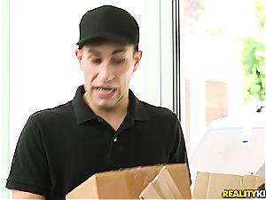 ash-blonde shakes her boobies riding the delivery dude